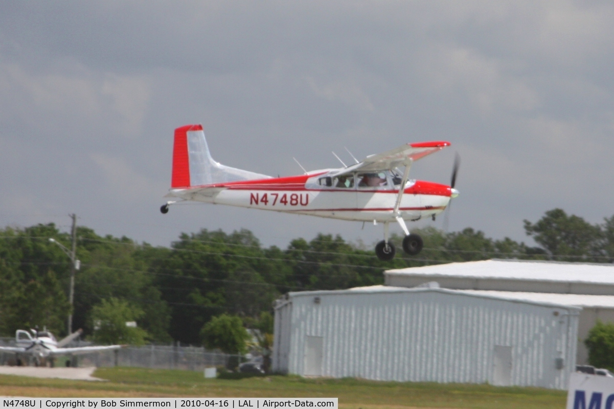 N4748U, 1965 Cessna 180 C/N 18051448, Arriving at Lakeland, Florida during Sun N Fun 2010.