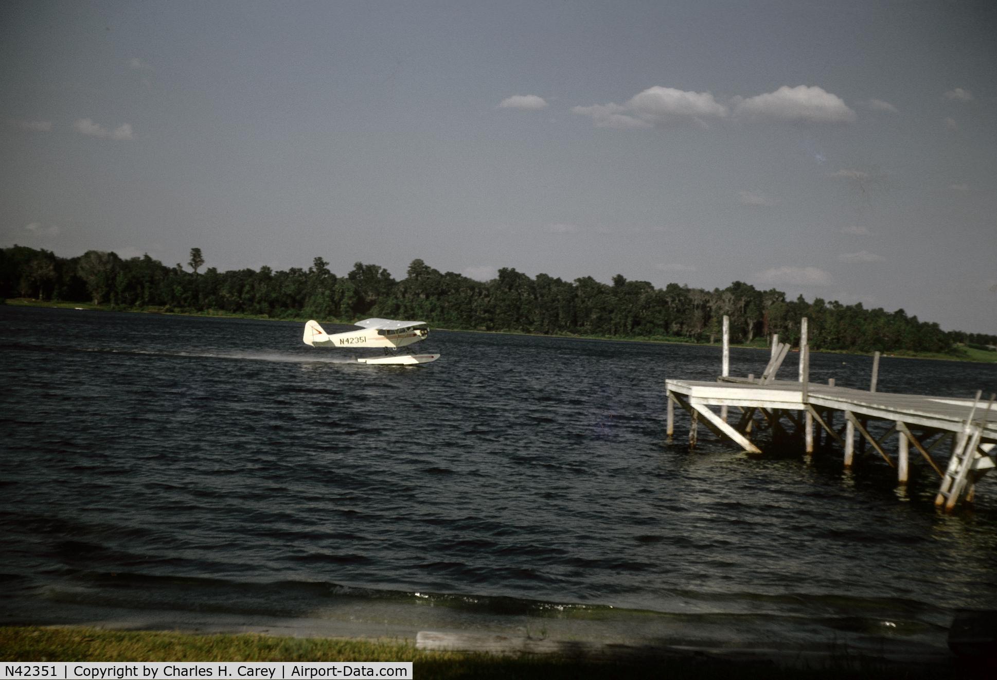 N42351, 1945 Piper J3C-65 Cub Cub C/N 14601, Taking off from Lake Iola, Pasco County, Florida, 1968, pilot and owner Tom McCabe