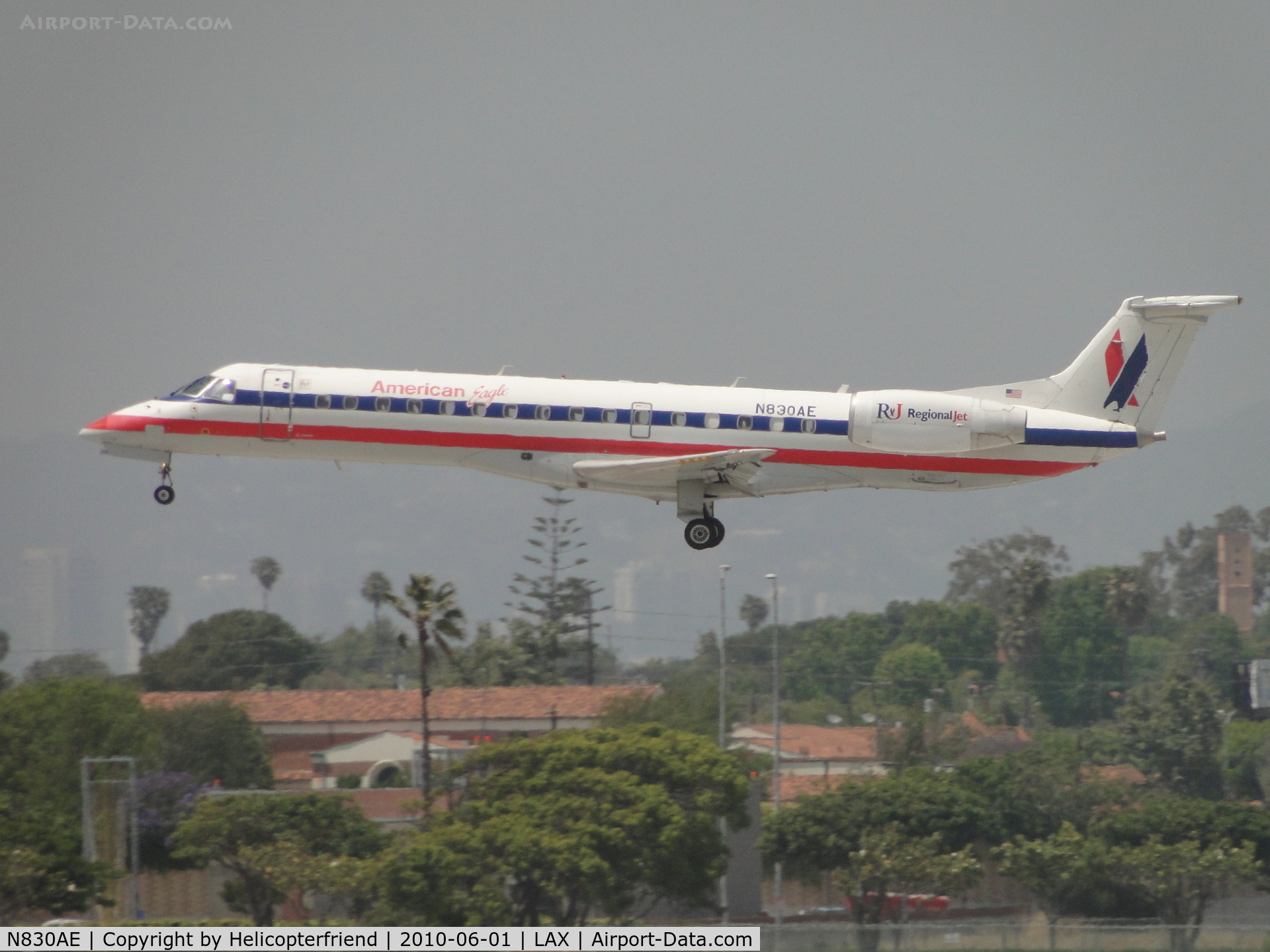 N830AE, 2002 Embraer ERJ-140LR (EMB-135KL) C/N 145615, American Eagle regional jet landing on runway 24R