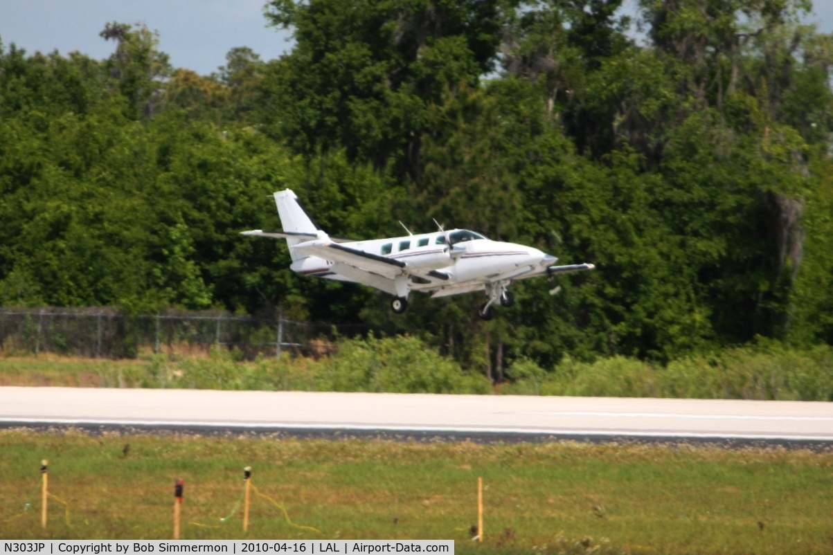 N303JP, 1982 Cessna T303 Crusader C/N T30300067, Arriving at Lakeland, Florida during Sun N Fun 2010.