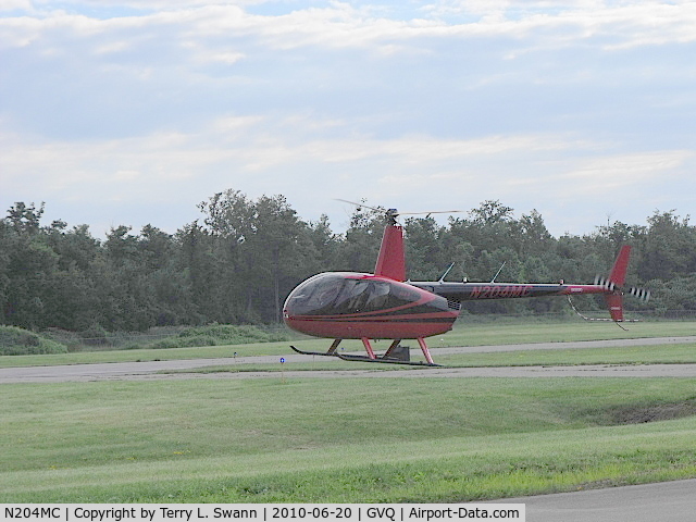 N204MC, Robinson R44 II C/N 12596, Hovering getting ready to park for breakfast.