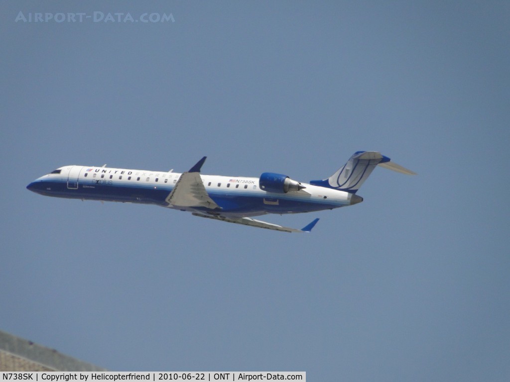 N738SK, 2005 Bombardier CRJ-700 (CL-600-2C10) Regional Jet C/N 10195, Sky Wests United Express loaded up and departing 26R