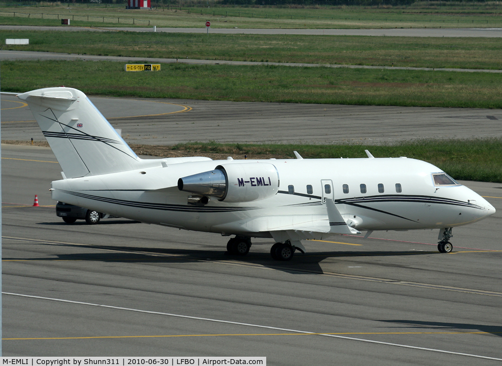 M-EMLI, 1998 Bombardier Challenger 604 (CL-600-2B16) C/N 5383, Parked at the General Aviation area...