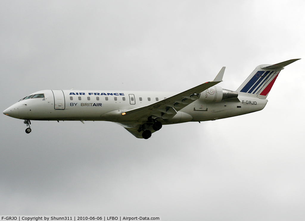 F-GRJO, 1999 Canadair CRJ-100ER (CL-600-2B19) C/N 7296, Landing rwy 32L with modified titles...