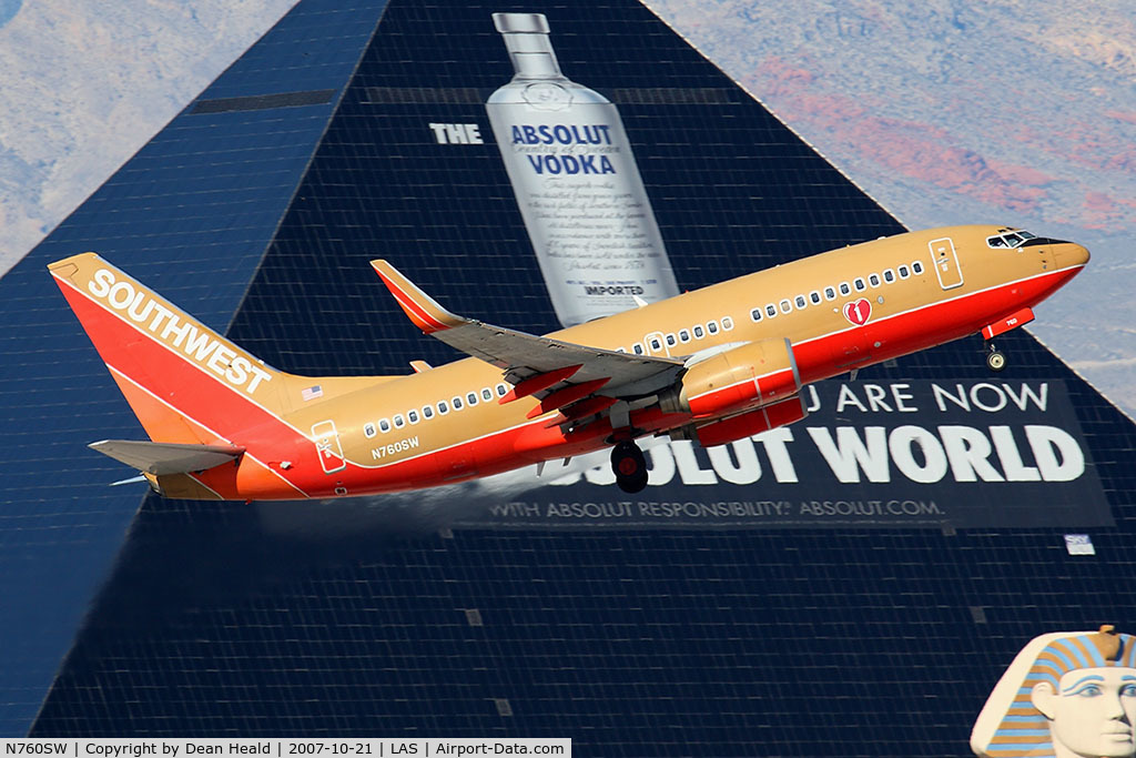N760SW, 2000 Boeing 737-7H4 C/N 27874, Southwest Airlines N760SW (FLT SWA624) passes in front of the Luxor Hotel & Casino while climbing out from RWY 1R enroute to Port Columbus Int'l (KCMH).