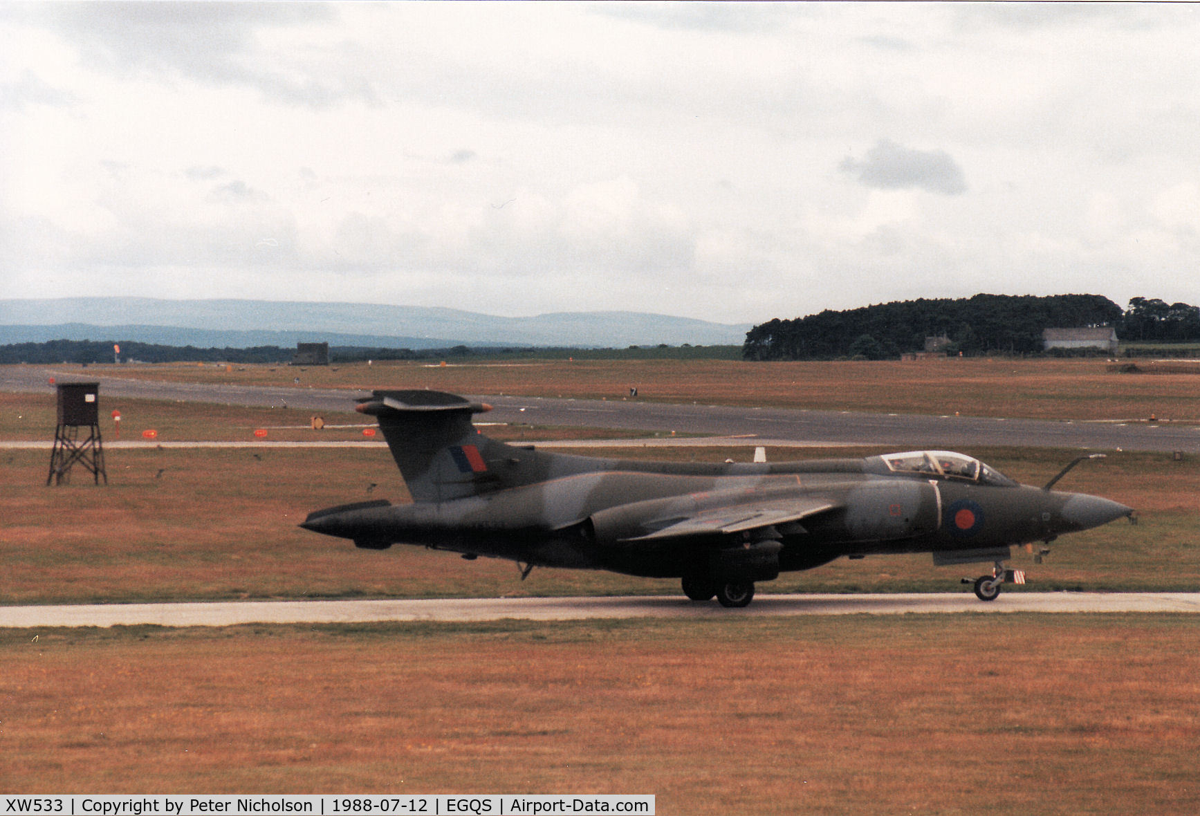 XW533, 1971 Hawker Siddeley Buccaneer S.2B C/N B3-02-70, Buccaneer S.2B of 237 Operational Conversion Unit awaiting clearance to join the active runway at RAF Lossiemouth in the Summer of 1988.