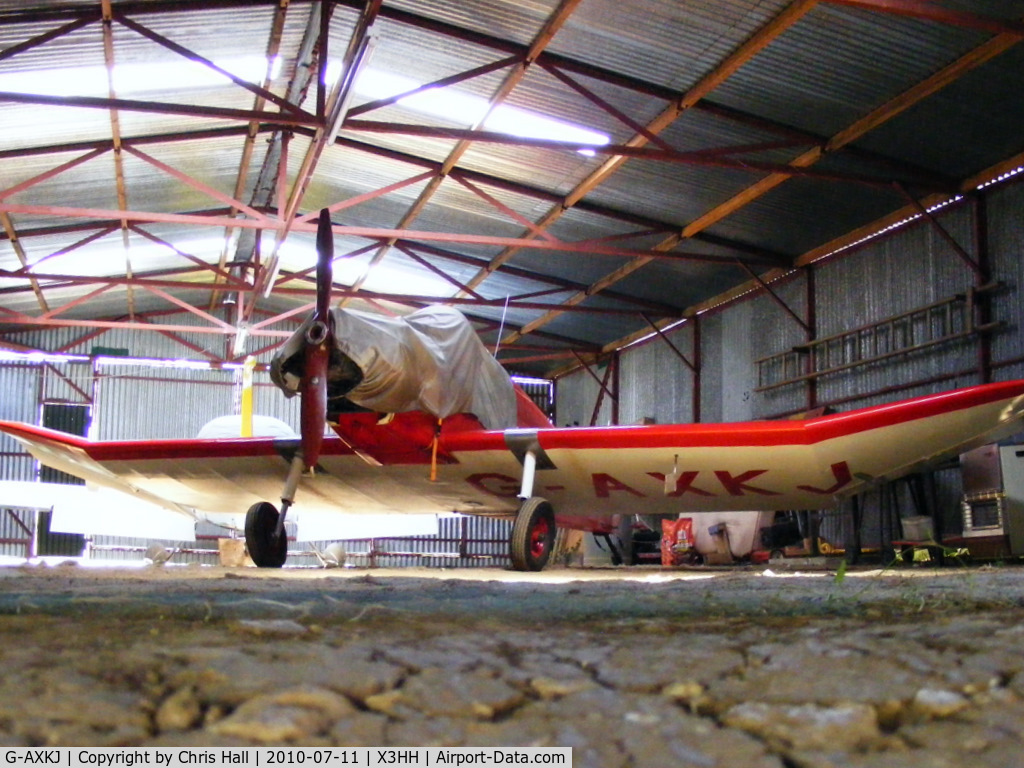 G-AXKJ, 1970 Jodel D-9 Bebe C/N PFA 941, shot from under the hangar door at Hinton in the Hedges.