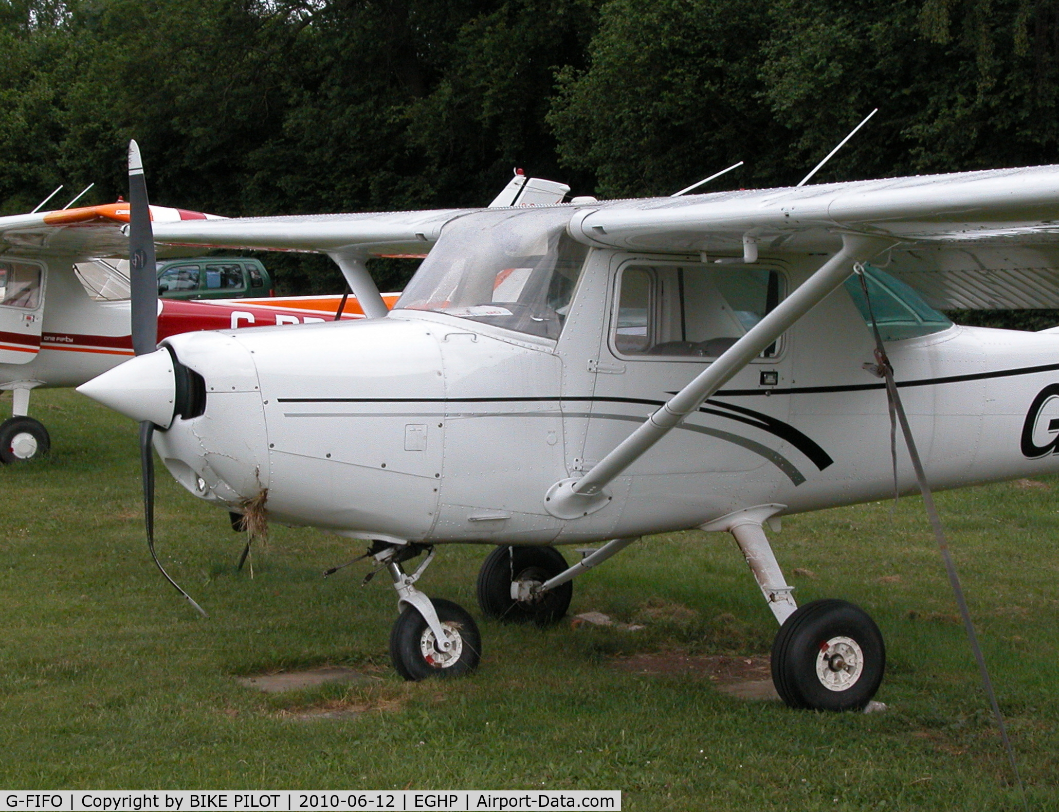 G-FIFO, 1981 Cessna 152 C/N 152-85177, DAMAGE TO RESIDENT CESSNA 152 AFTER FLIPPING OVER ON LANDING PILOT OK.