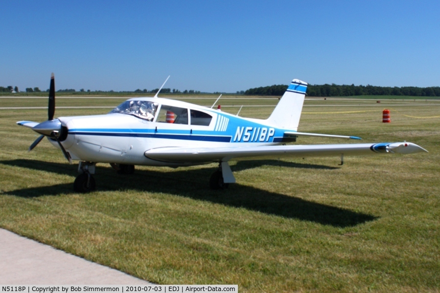 N5118P, 1958 Piper PA-24-250 Comanche C/N 24-131, Parked in the grass at Bellefontaine, Ohio during the 2010 air show.