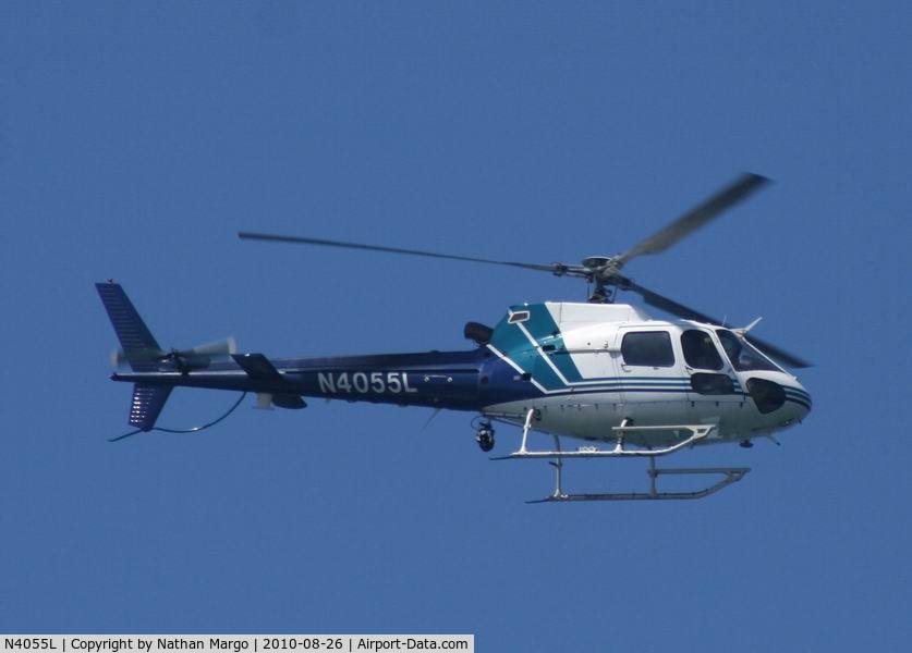 N4055L, 1996 Eurocopter AS-350B-2 Ecureuil C/N 2916, Seen flying North over Ocean Beach Pier, San Diego, California.