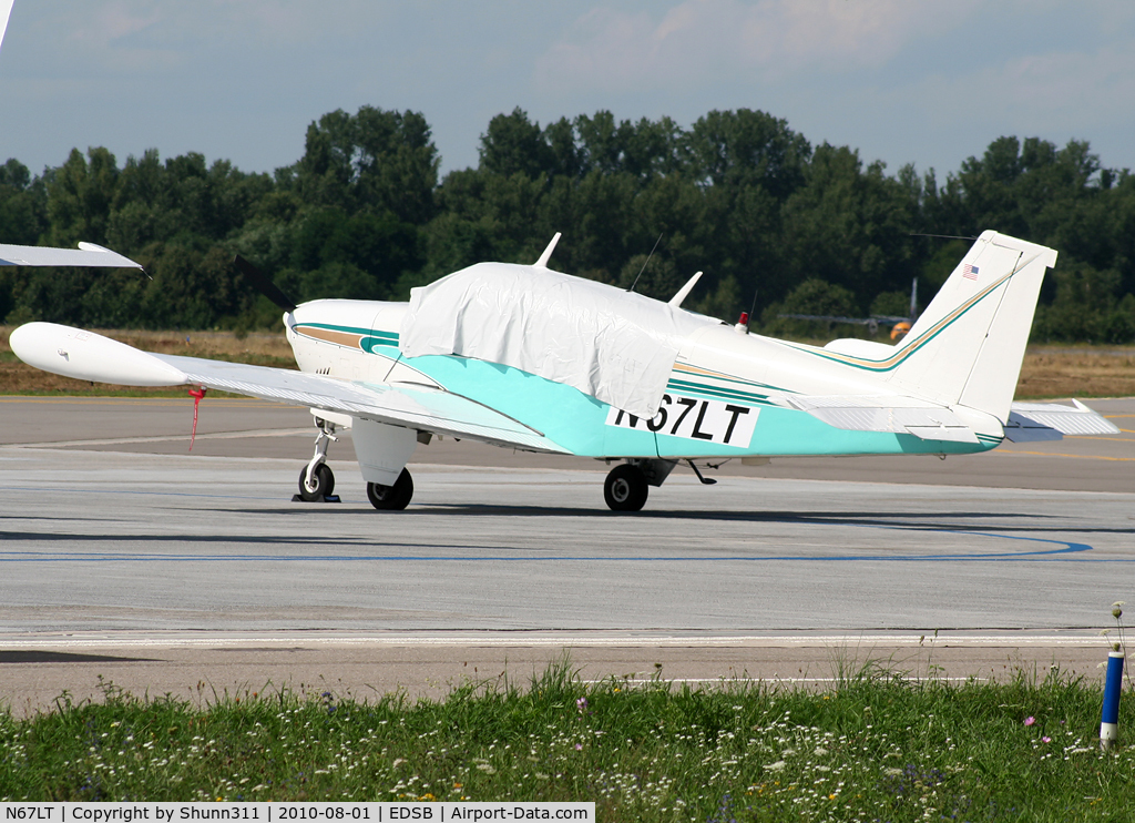 N67LT, Beech 35-C33 Debonair C/N CD-913, Parked at the General Aviation area...