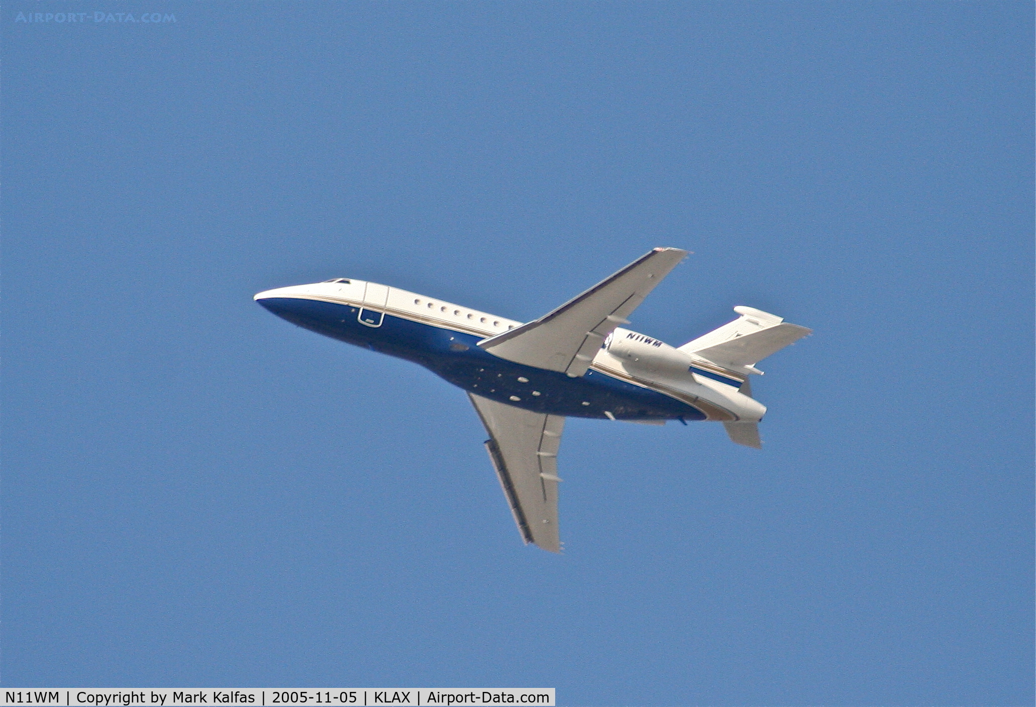 N11WM, 1999 Dassault Falcon 900EX C/N 58, AZAAIR Dassault FALCON 900 EX, N11WM departing 25R KLAX.