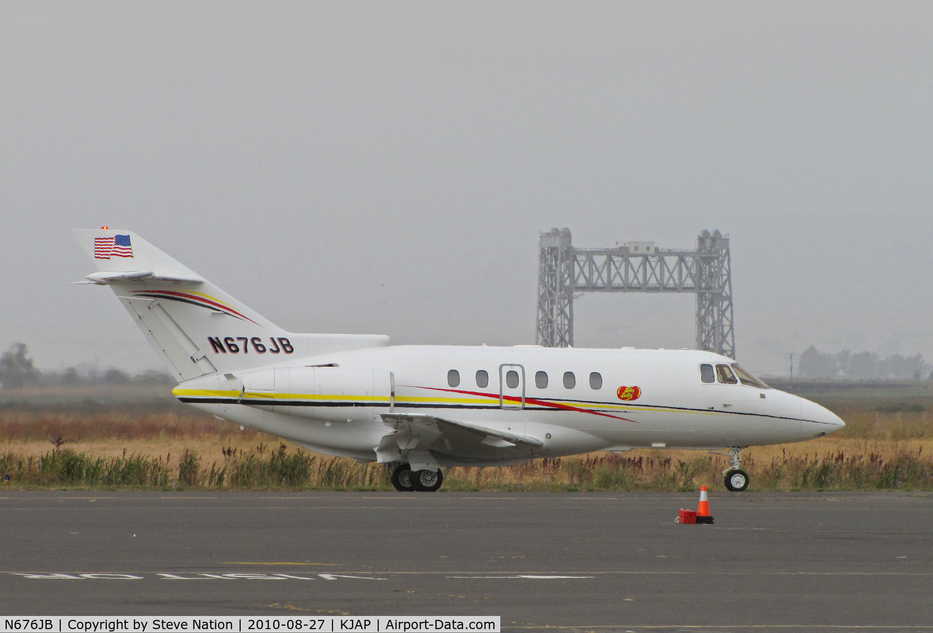 N676JB, 2003 Raytheon Hawker 800XP C/N 258619, Jelly Belly Candy (Fairfield, CA) 2003 Hawker 800XP taxing past Napa River RR bridge on departure for KGPI (Glacier Park Int'l Airport, Kalispell, MT) as 