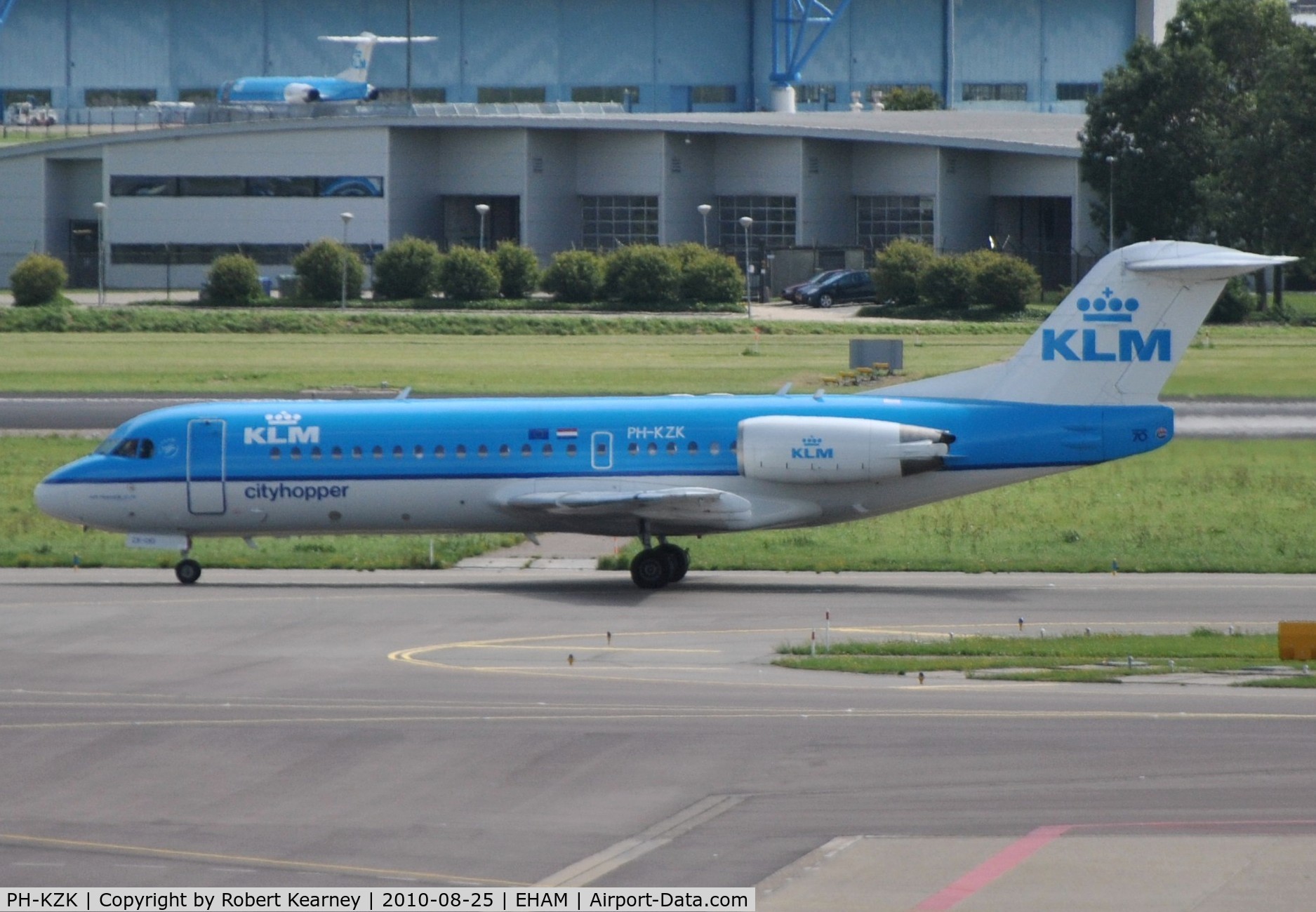 PH-KZK, 1997 Fokker 70 (F-28-0070) C/N 11581, And another KLM cityhopper taxiing for take off