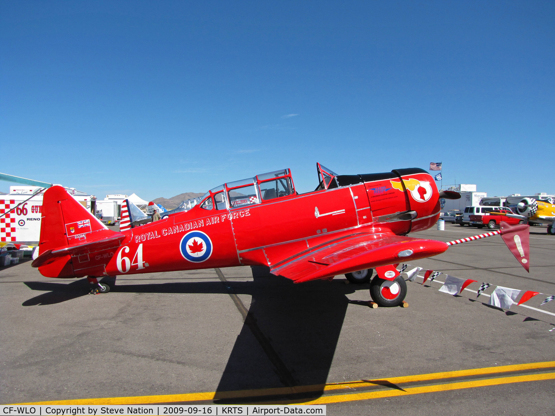 CF-WLO, 1945 Canadian Car & Foundry T-6 Harvard Mk.4 C/N CCF4-55, Race #64 is a CCF Harvard Mk. IV in Royal Canadian Air Force Red Knights colors being readied for T-6 Class racing @ 2009 Reno Air Races