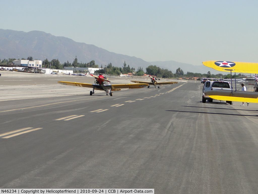 N46234, 1941 Ryan Aeronautical ST3KR C/N 1074, N46234 and N56026 taxiing to hangers