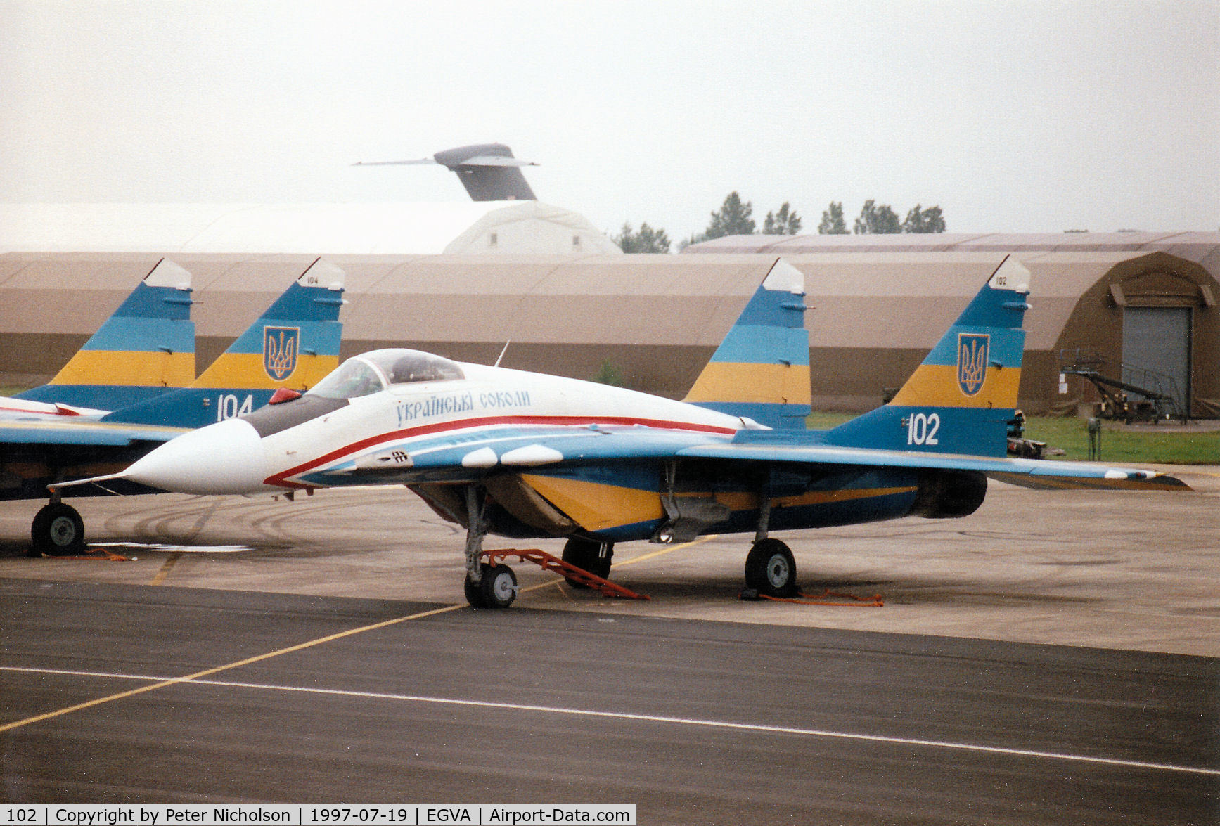 102, Mikoyan-Gurevich MiG-29 C/N 31225, MiG-29A Fulcrum of the Ukranian Falcons display team on the flight-line at the 1997 Intnl Air Tattoo at RAF Fairford.