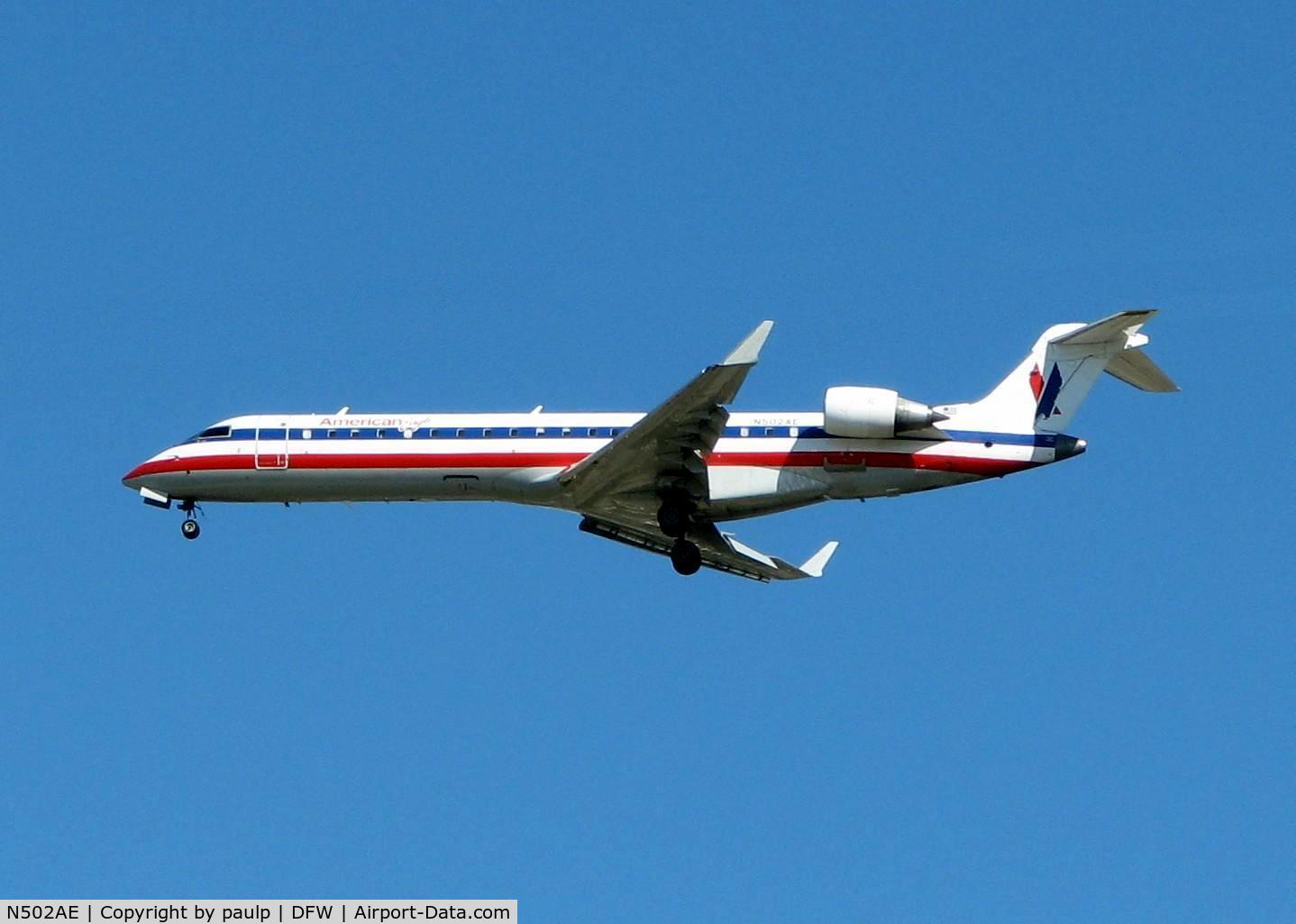 N502AE, 2001 Canadair CL-600-2C10 Regional Jet CRJ-701ER C/N 10018, Landing at DFW.