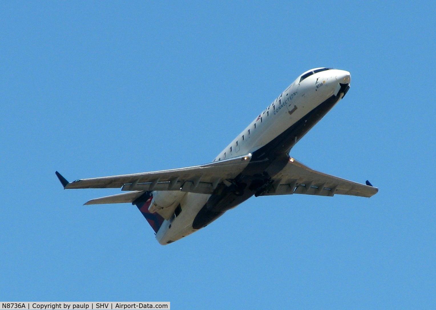 N8736A, 2003 Canadair CRJ-440 (CL-600-2B19) Regional Jet C/N 7736, Off of 14 at Shreveport Regional.