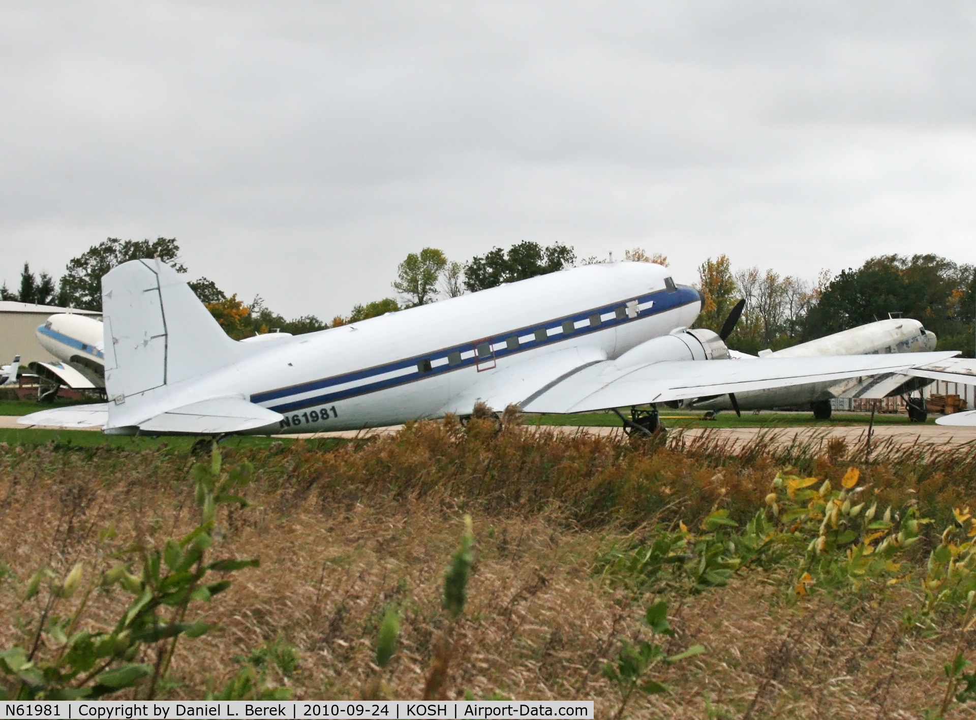 N61981, 1940 Douglas DC-3A C/N 2216, Built as a DST and delivered to American Airlines before the War, this beautiful bird awaits conversion or restoration at the Basler Turbo ramp.