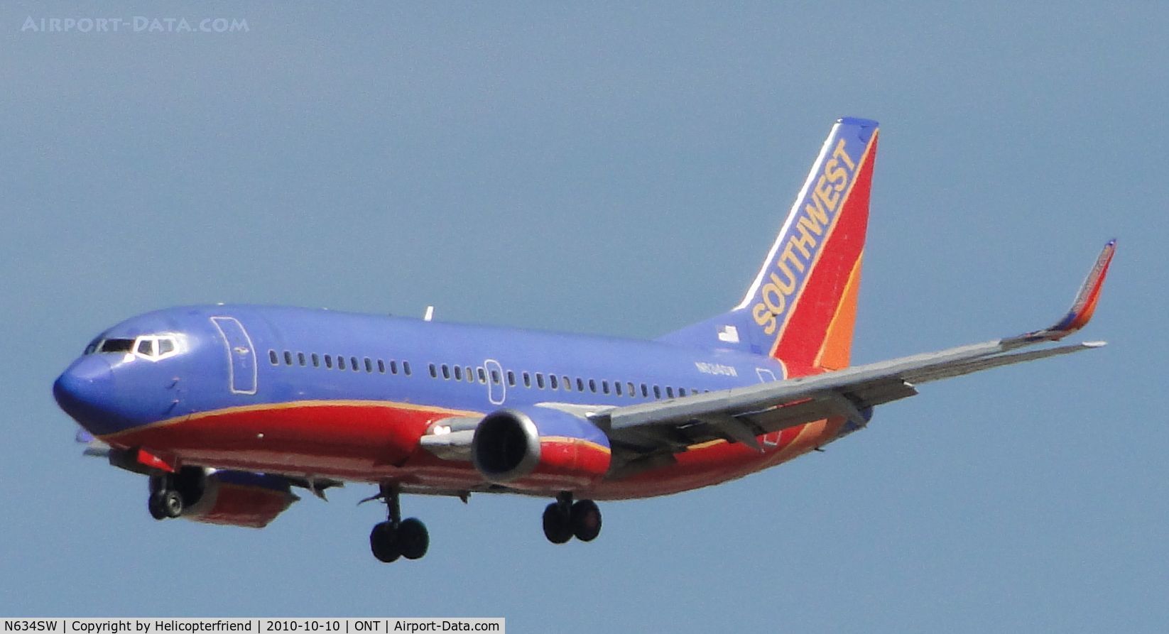 N634SW, 1996 Boeing 737-3H4 C/N 27937, On final to runway 26R before Military aircraft arrived