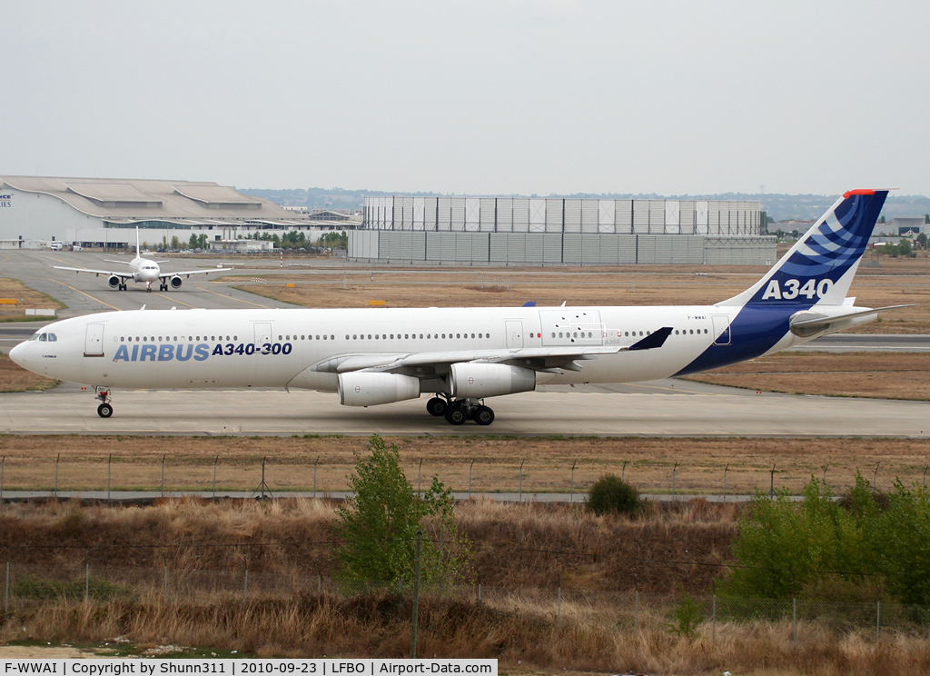 F-WWAI, 1991 Airbus A340-311 C/N 001, Taxiing holding point rwy 14R... Additional Demonstrator panel for the A350XWB