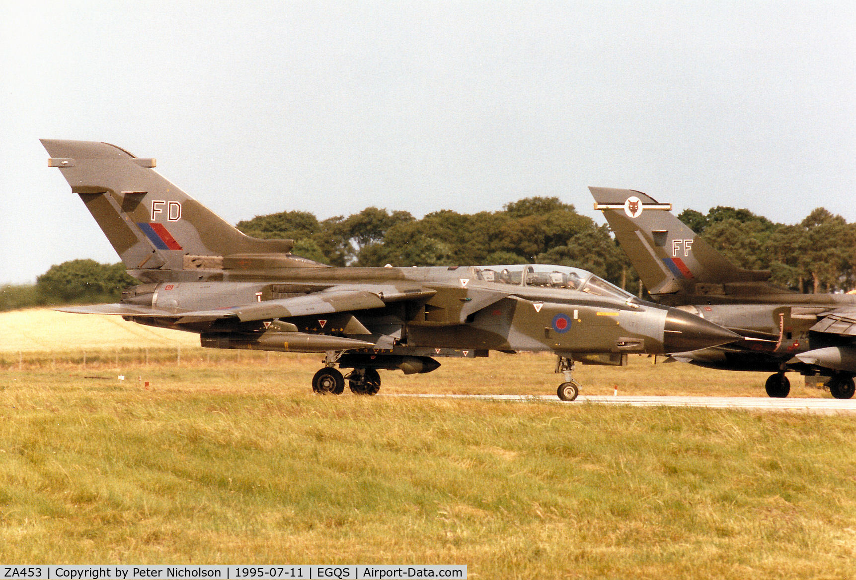 ZA453, 1983 Panavia Tornado GR.1B C/N BS083/249/3119, Tornado GR.1B of 12 Squadron joining the active runway at RAF Lossiemouth in the Summer of 1995.