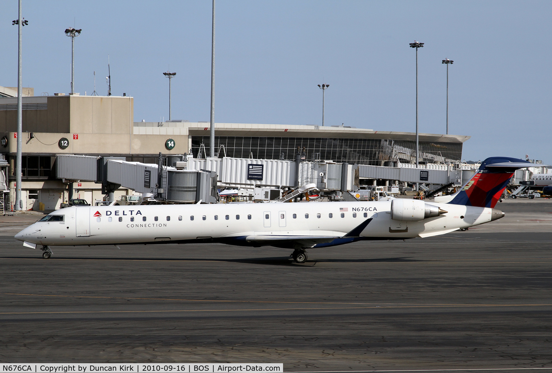 N676CA, 2007 Bombardier CRJ-900ER (CL-600-2D24) C/N 15127, Looks like a little paint is needed on the tail.