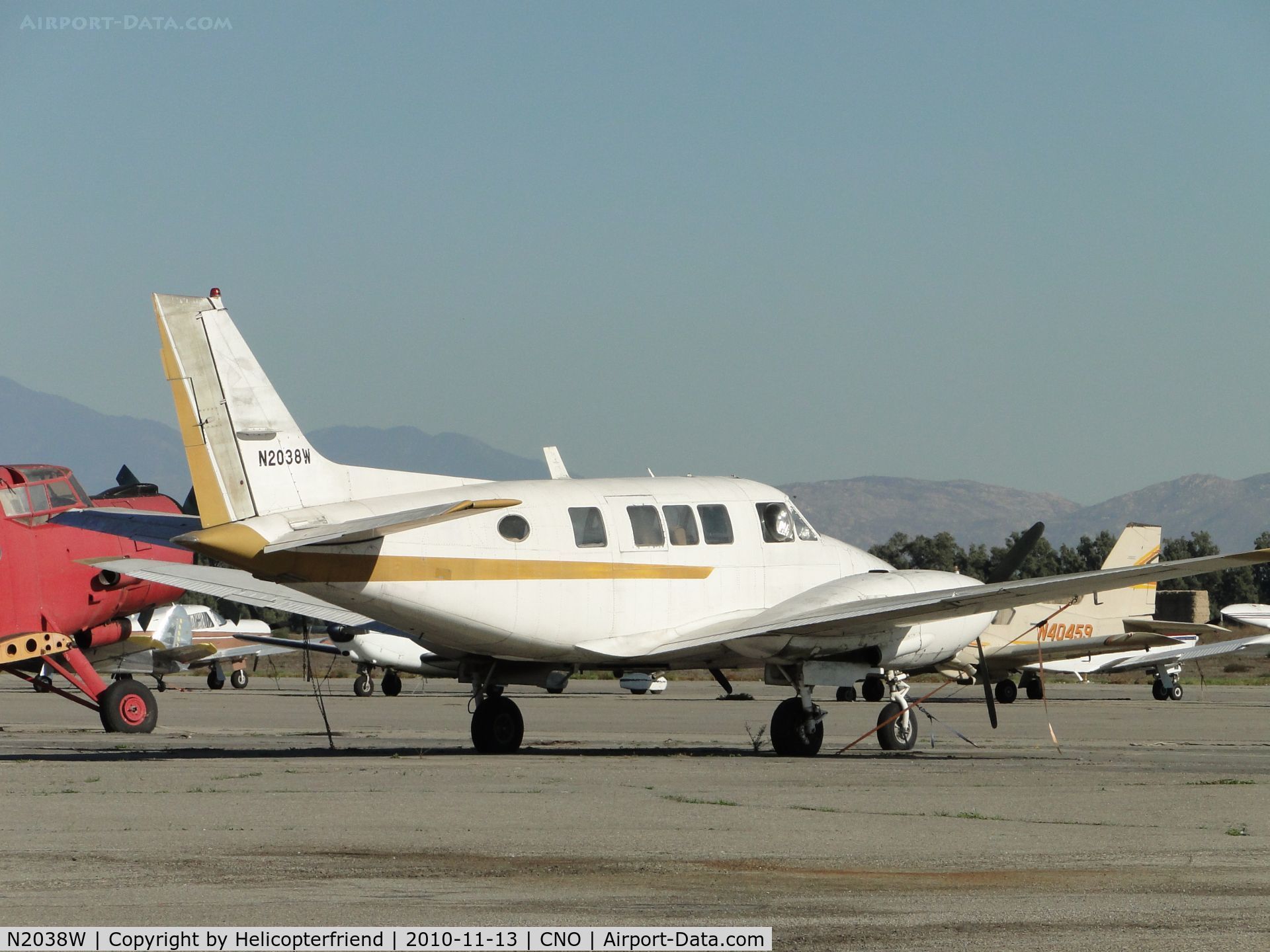N2038W, 1973 Beech 65-B80 Queen Air C/N LD-459, Parked east of the tower