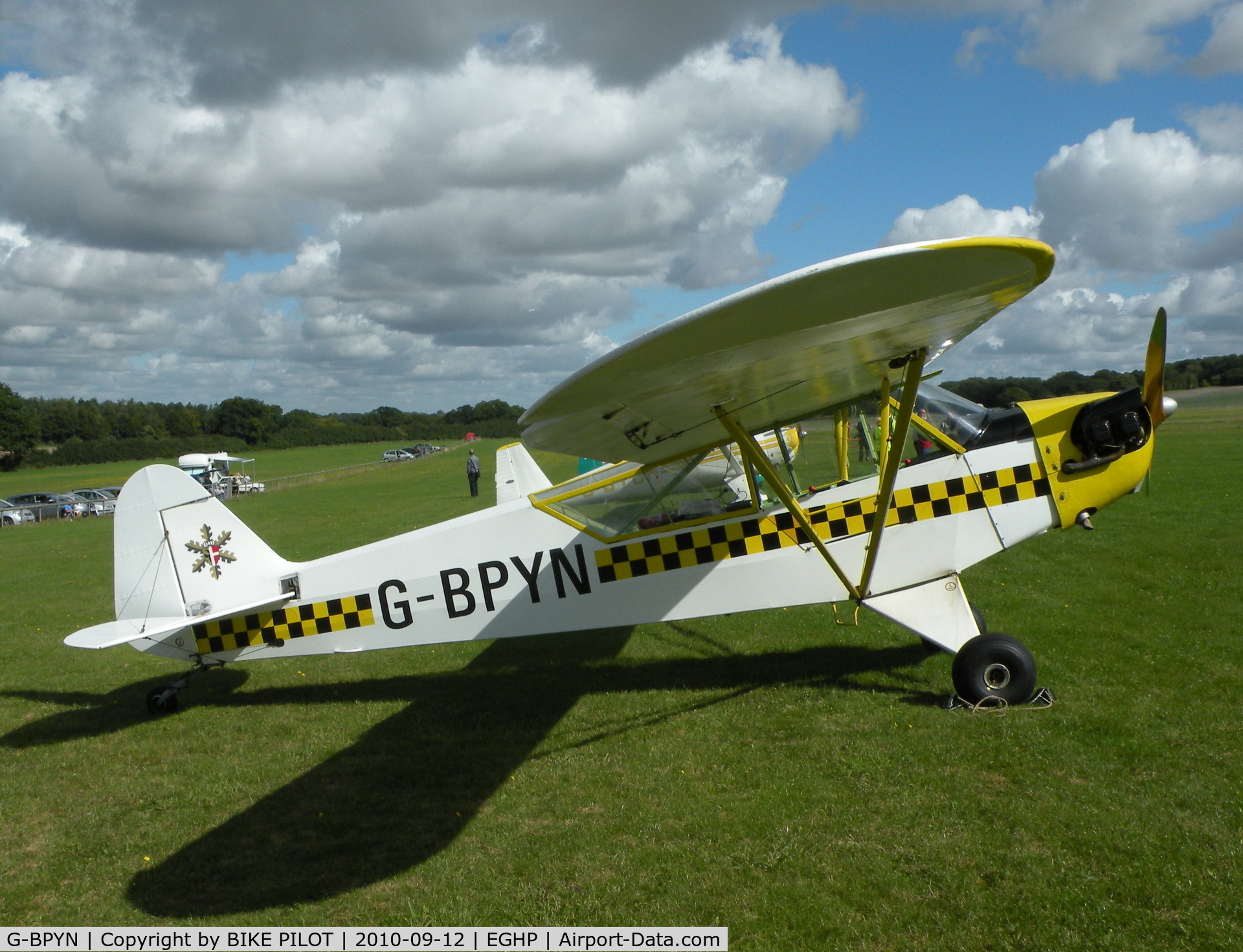 G-BPYN, 1943 Piper L-4H Grasshopper (J3C-65D) C/N 11422, Snazzy Color scheme on this Cub