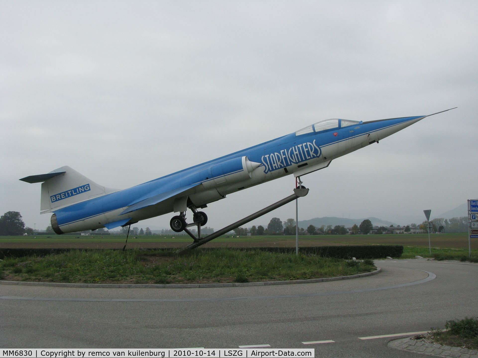 MM6830, Aeritalia F-104S-ASA Starfighter C/N 1130, preserved at roundabout in Breitling advertisement c/s. Wears no serial outside