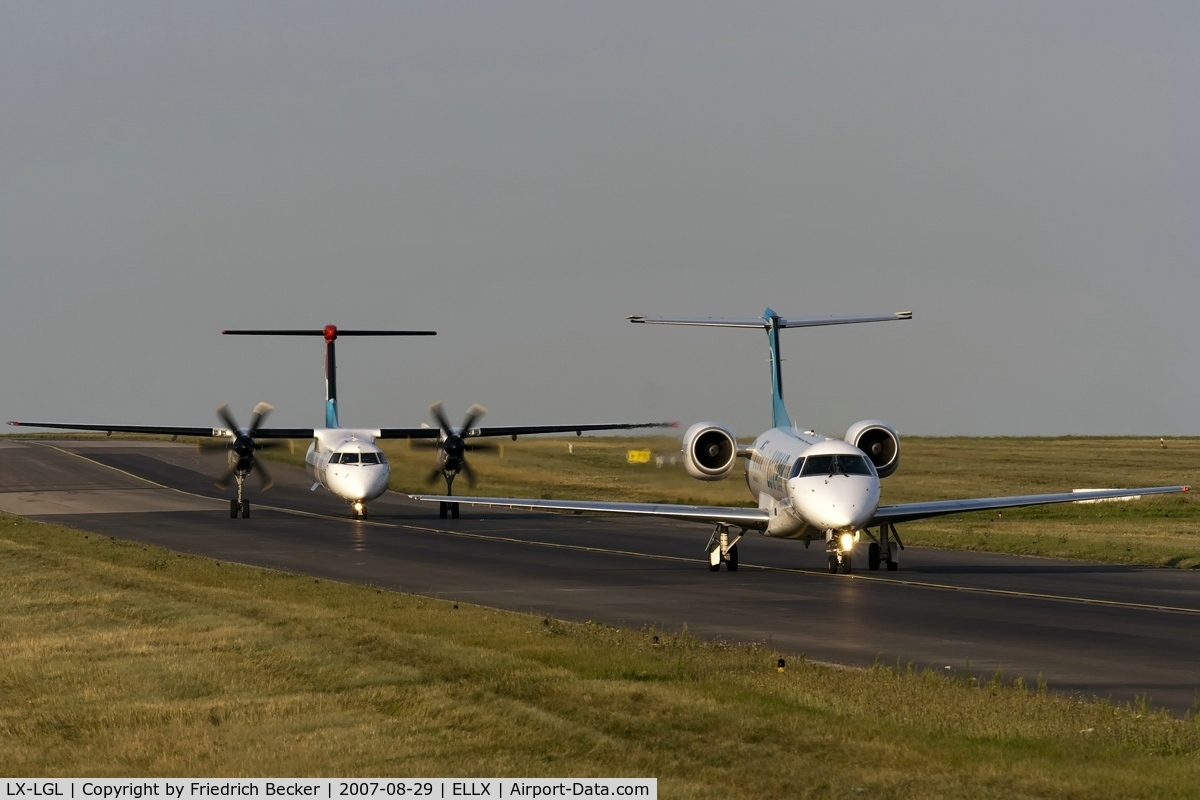 LX-LGL, 2005 Embraer ERJ-135LR (EMB-135LR) C/N 14500893, taxying to the active