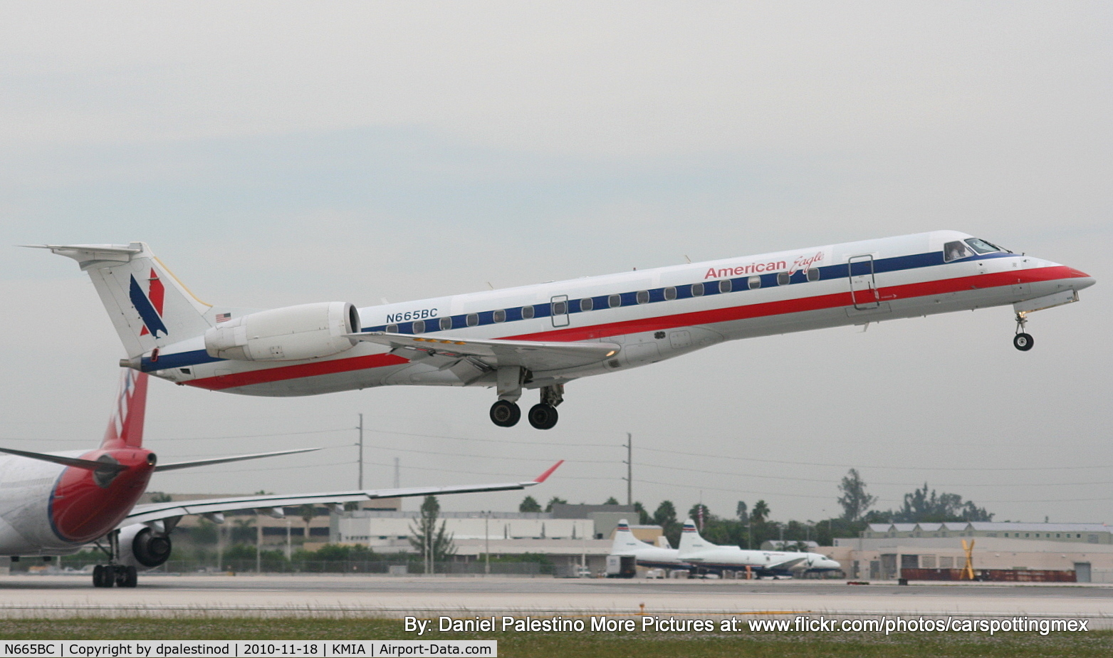 N665BC, 2004 Embraer ERJ-145LR (EMB-145LR) C/N 145783, Landing on RWY 12 at Miami!