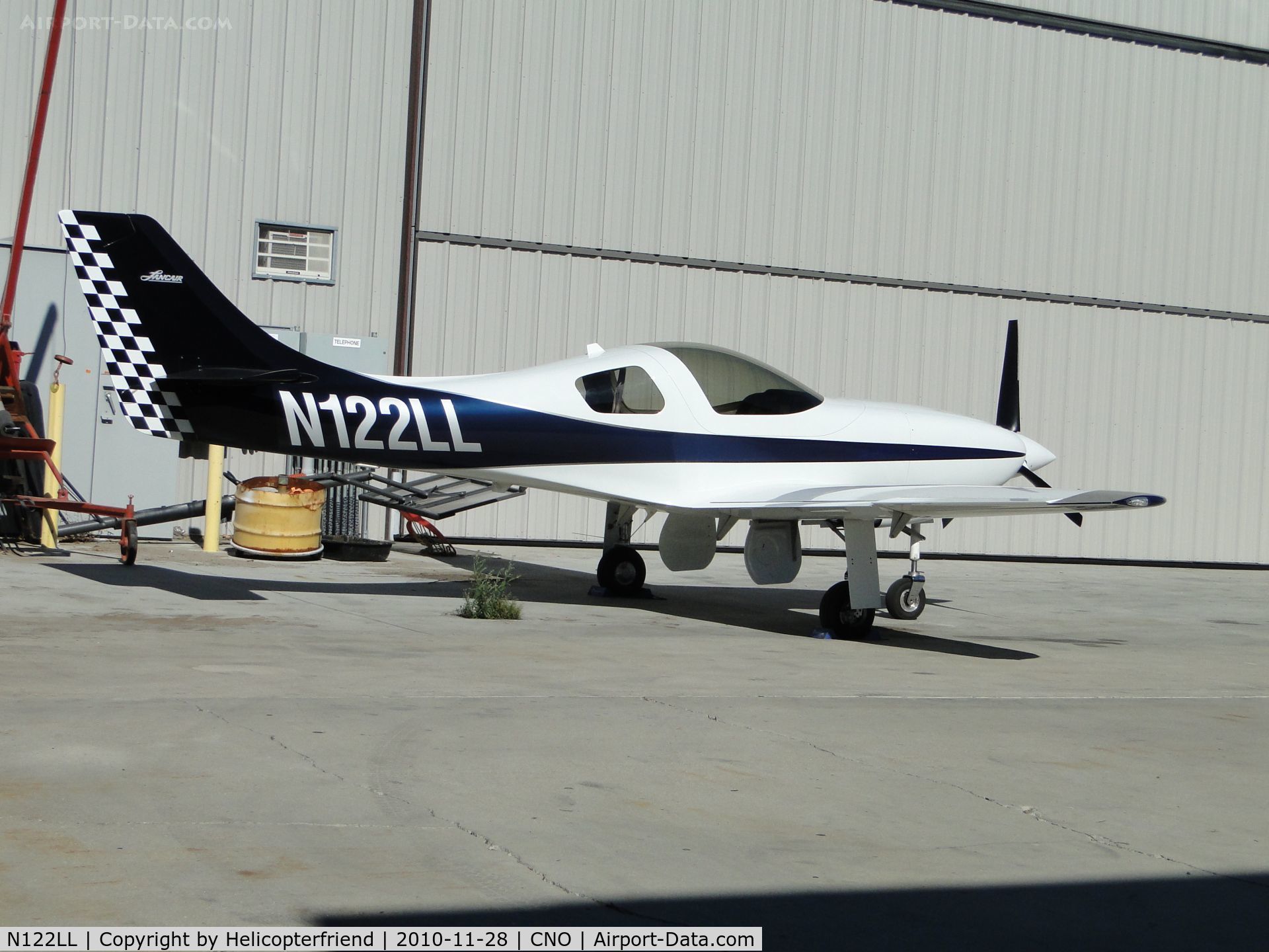 N122LL, 2003 Lancair Legacy 2000 C/N L2K-114, Parked next to a hanger