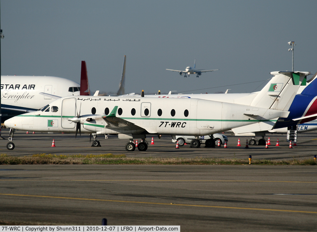 7T-WRC, 2001 Beech 1900D C/N UE-413, Parked at the General Aviation area... Arabic titles...