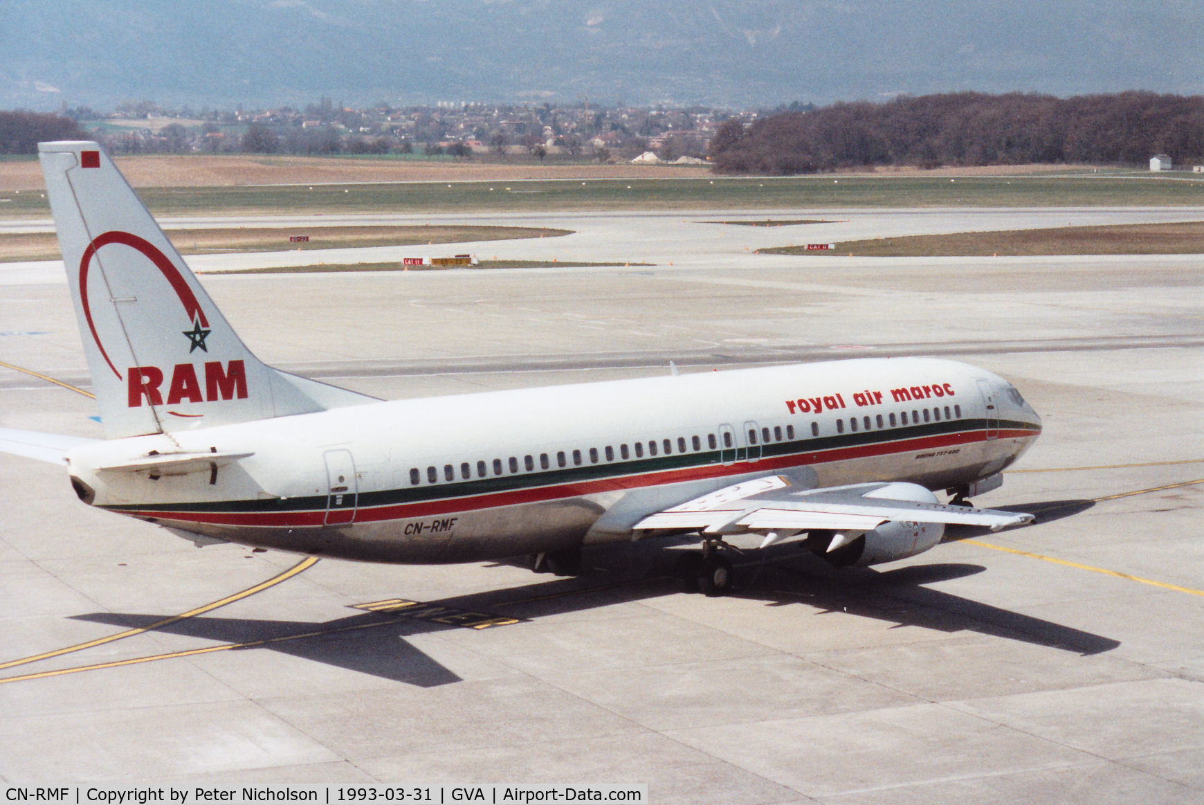 CN-RMF, 1990 Boeing 737-4B6 C/N 24807-1880, Boeing 737-4B6 of Royal Air Maroc heading for the active runway at Geneva in March 1993.