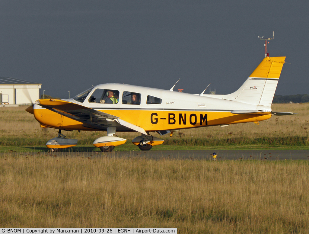 G-BNOM, 1987 Piper PA-28-161 Cherokee Warrior II C/N 2816024, Taxiing in