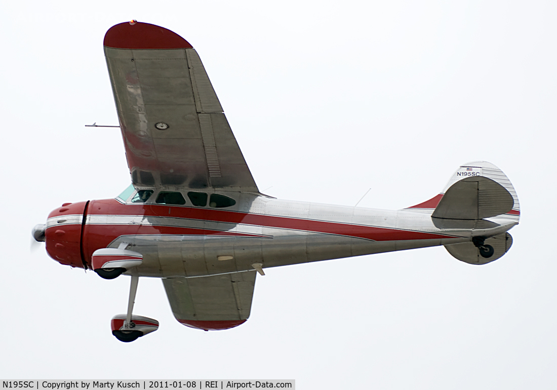 N195SC, 1949 Cessna 195 C/N 7402, Departing Runway 26.