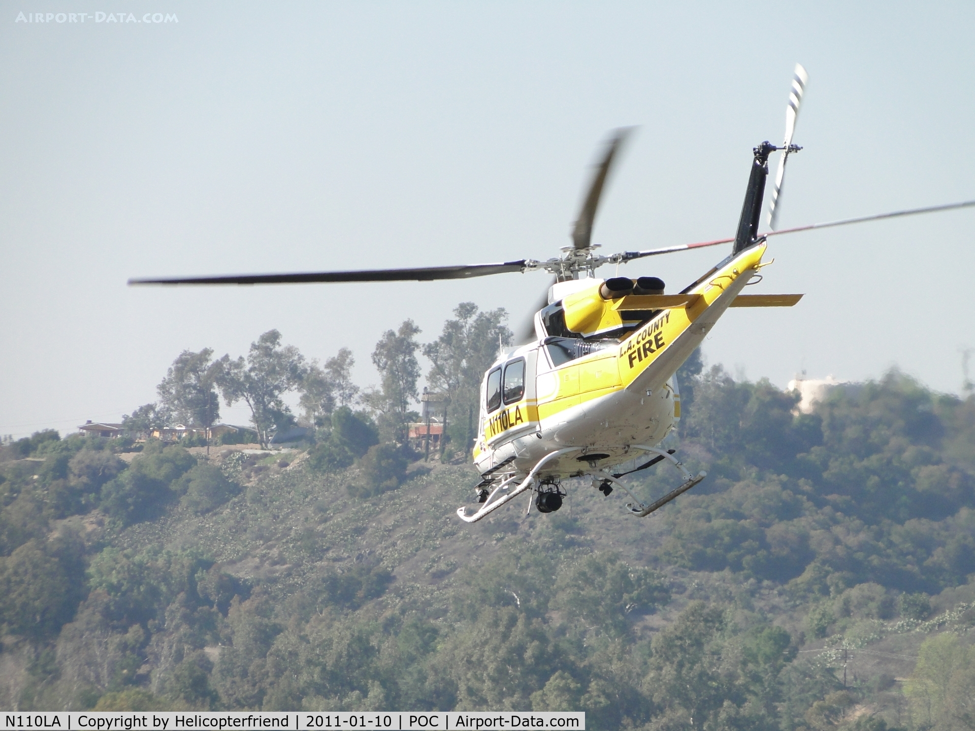 N110LA, 2005 Bell 412EP C/N 36392, Headed westbound down taxiway Sierra