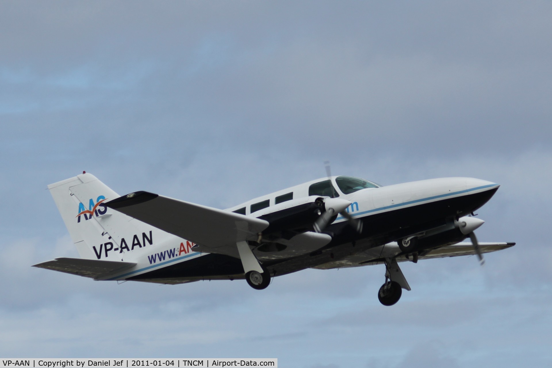 VP-AAN, 1979 Cessna 402C Businessliner C/N 402C0029, VP-AAN departing TNCM