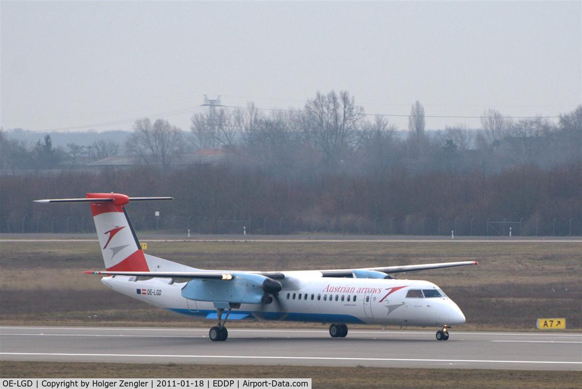 OE-LGD, 2000 De Havilland Canada DHC-8-402Q Dash 8 C/N 4027, An arrow takes 26R for a jump to Vienna via Dresden.