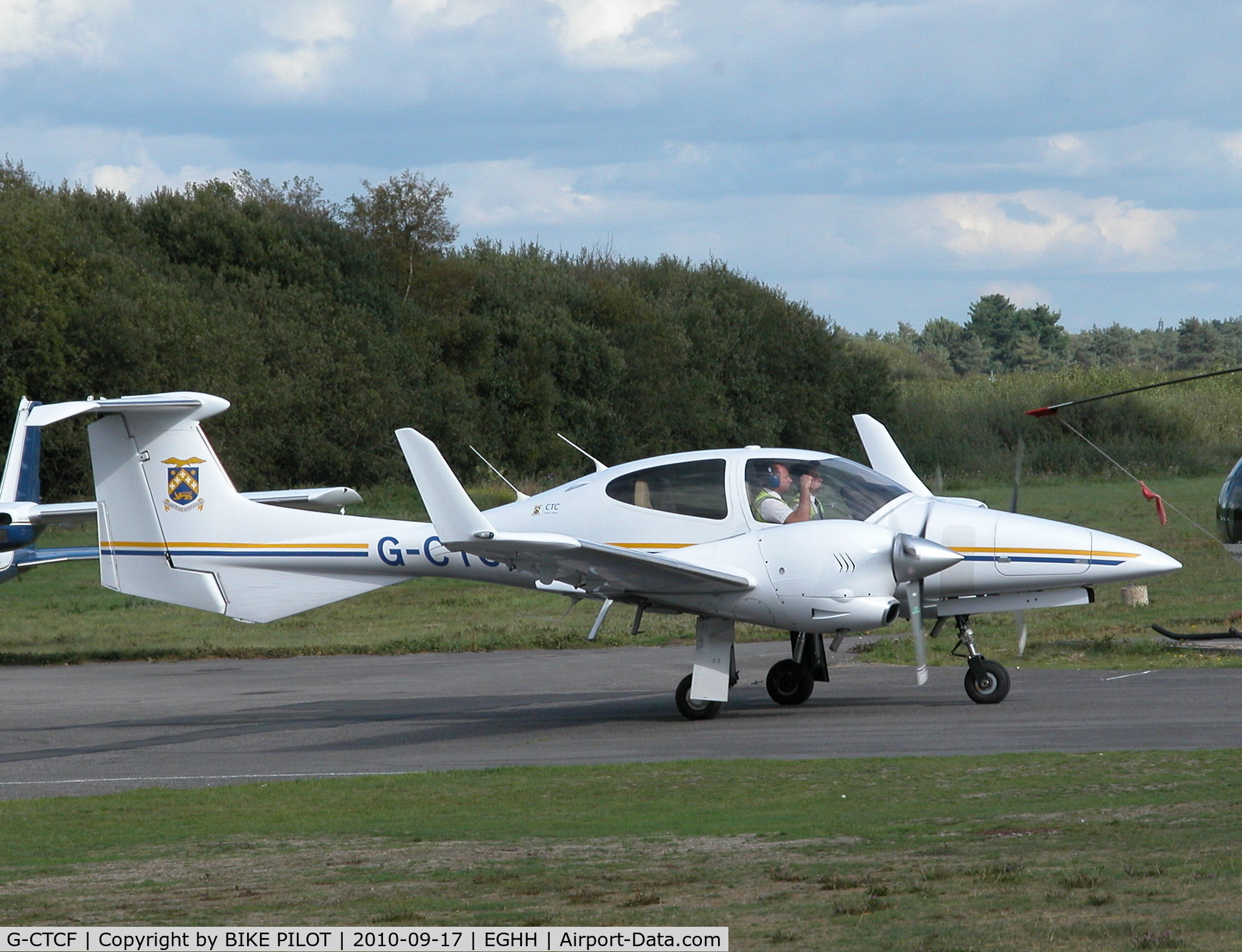 G-CTCF, 2005 Diamond DA-42 Twin Star C/N 42.045, Taxying past the Flying Club to rwy 26