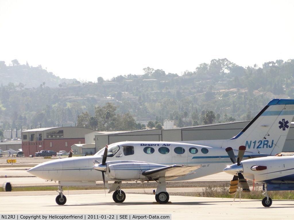 N12RJ, 1977 Cessna 421C Golden Eagle C/N 421C0306, Parked south of Jet Air hnager area