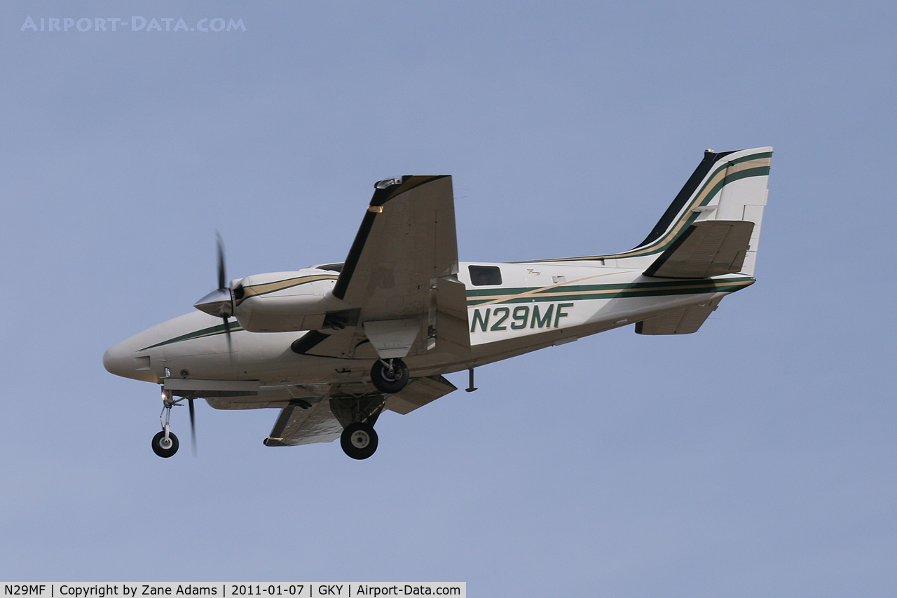 N29MF, 2000 Raytheon Aircraft Company 58 C/N TH-1966, 2011 Cotton Bowl game day traffic landing at Arlington Municipal Airport