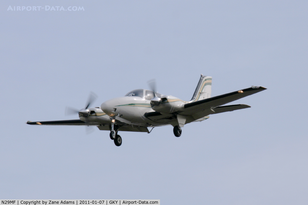 N29MF, 2000 Raytheon Aircraft Company 58 C/N TH-1966, 2011 Cotton Bowl game day traffic landing at Arlington Municipal Airport