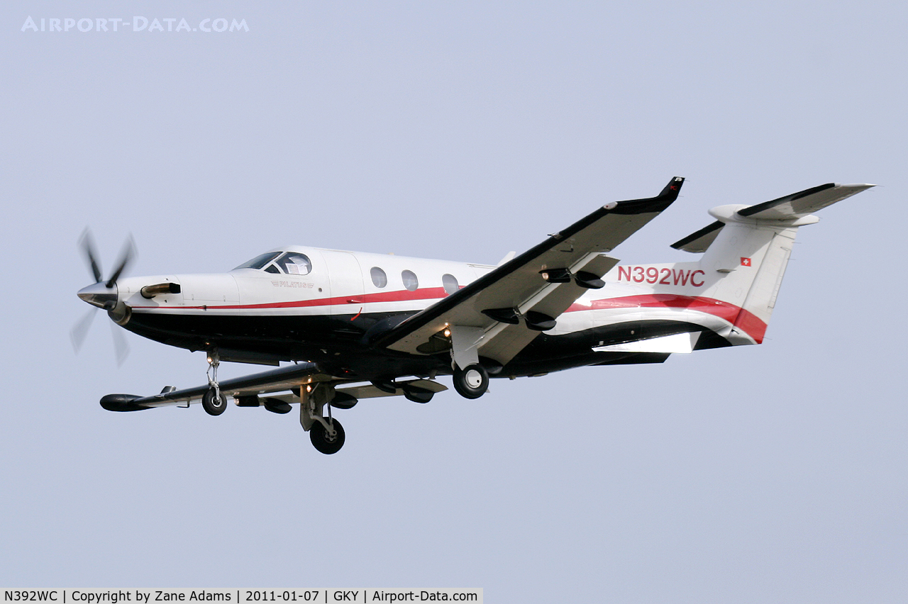 N392WC, 2000 Pilatus PC-12/45 C/N 392, 2011 Cotton Bowl game day traffic landing at Arlington Municipal Airport