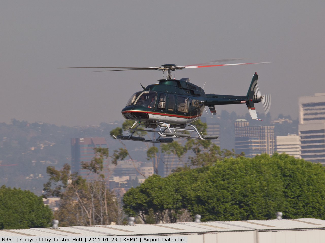 N35L, 2000 Bell 407 C/N 53402, N35L arriving on RWY 21