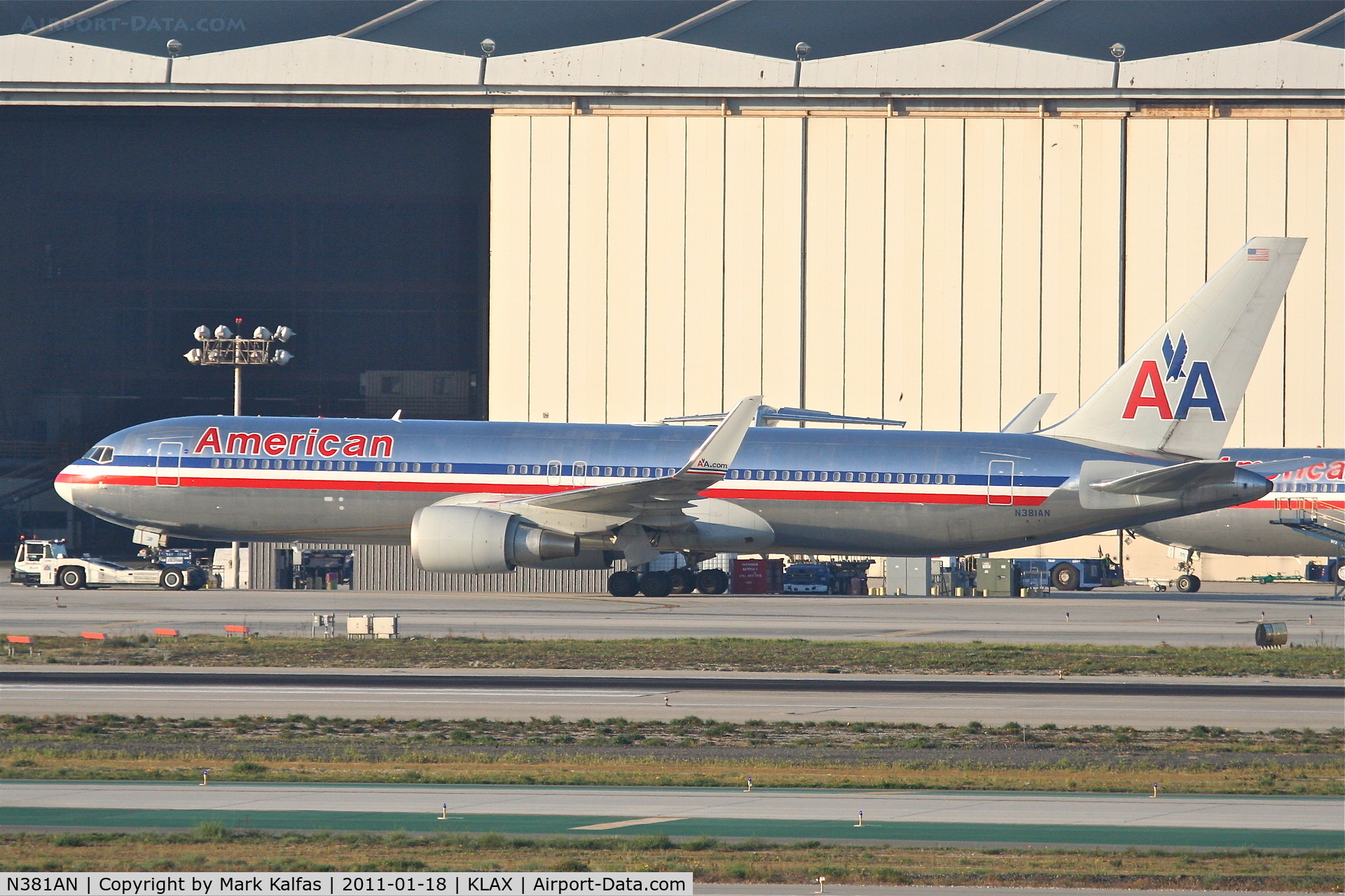 N381AN, 1993 Boeing 767-323 C/N 25450, American Airlines Boeing 767-323, getting a tow to the AA maintenance hangar at KLAX.