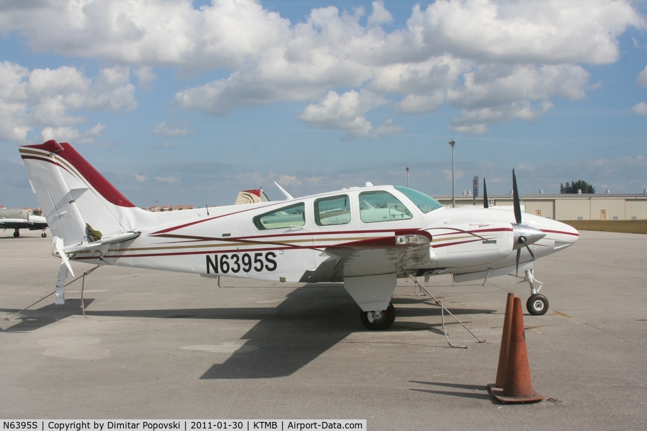 N6395S, 1974 Beech E-55 Baron C/N TE-987, Suffered considerable damage to tail when another running AND unmanned aircraft taxied right into it.  The pilot of the other aircraft had gotten out to take pictures of his running aircraft when it broke off from the tie-downs.