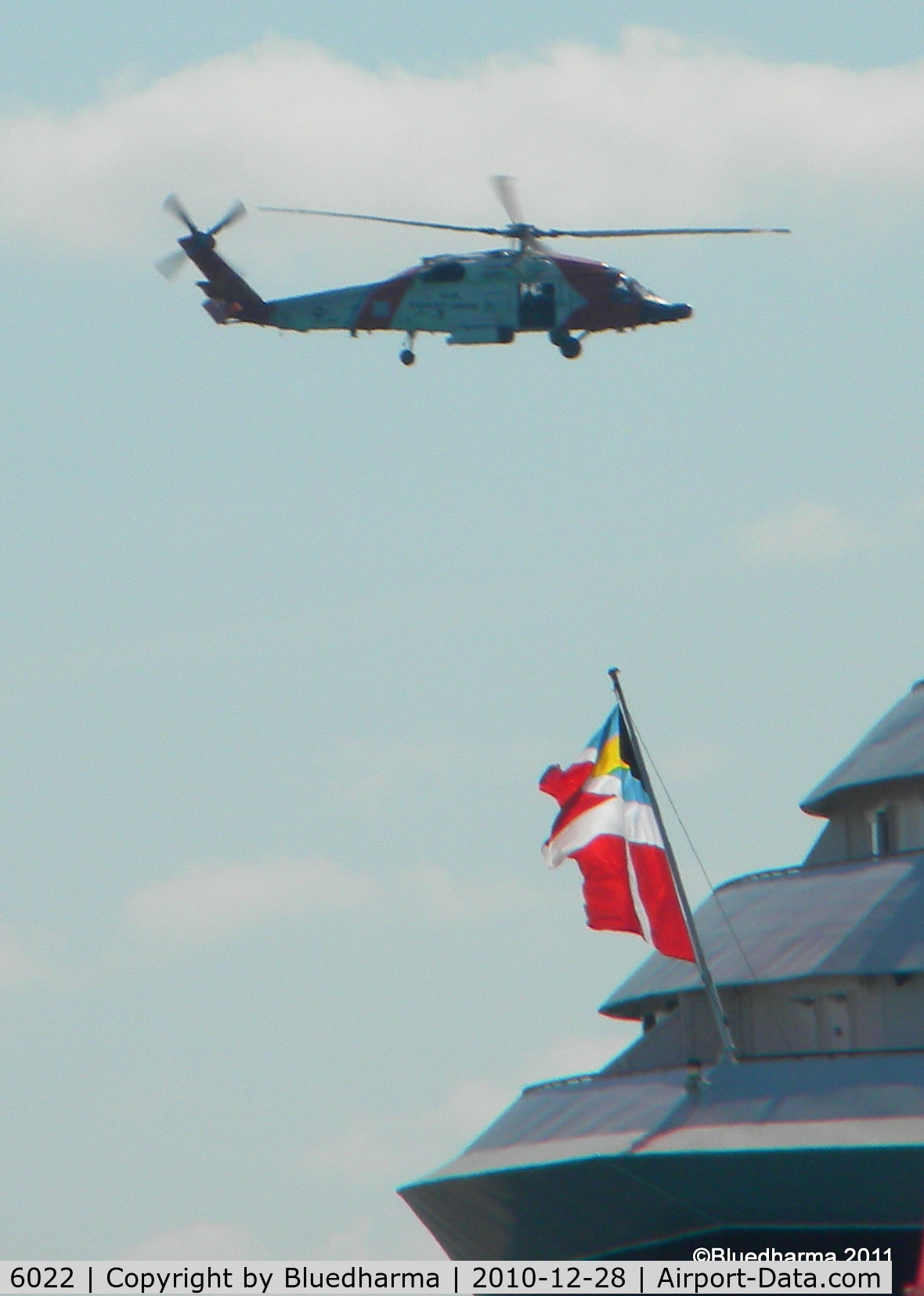 6022, Sikorsky HH-60J Jayhawk C/N 70.1705, Flying over the Disney Magic cruise ship at Castaway Cay.